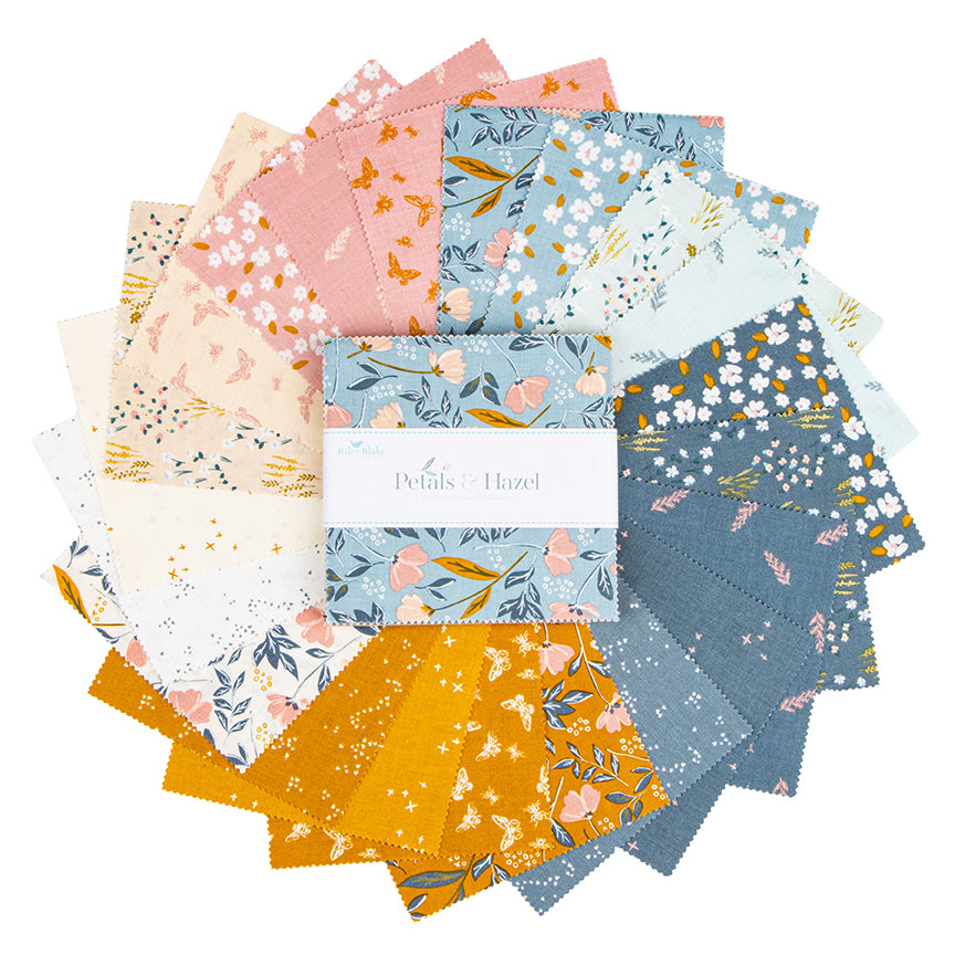 A circular arrangement of fabric swatches from the 'Petals of Hazel' quilting collection, featuring various floral and butterfly patterns in pastel pink, blue, yellow, and cream on a white background.
