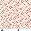 Floral pattern fabric with a ruler for scale on a beige background