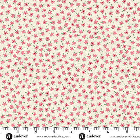 Floral pattern fabric with a ruler for scale on a beige background