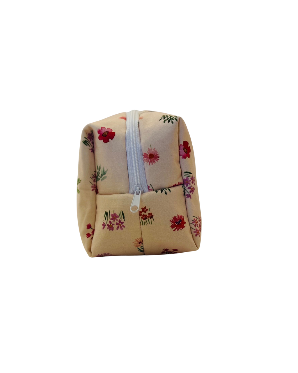 pink Floral-patterned cosmetic bag with a white zipper on a light background