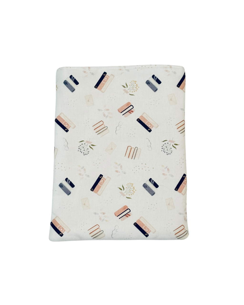 white, pink, and blue e-reader case with a pattern containing florals and stacked books
