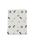 white, pink, and blue e-reader case with a pattern containing florals and stacked books