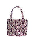 white tote bag with purple woodland print against white background