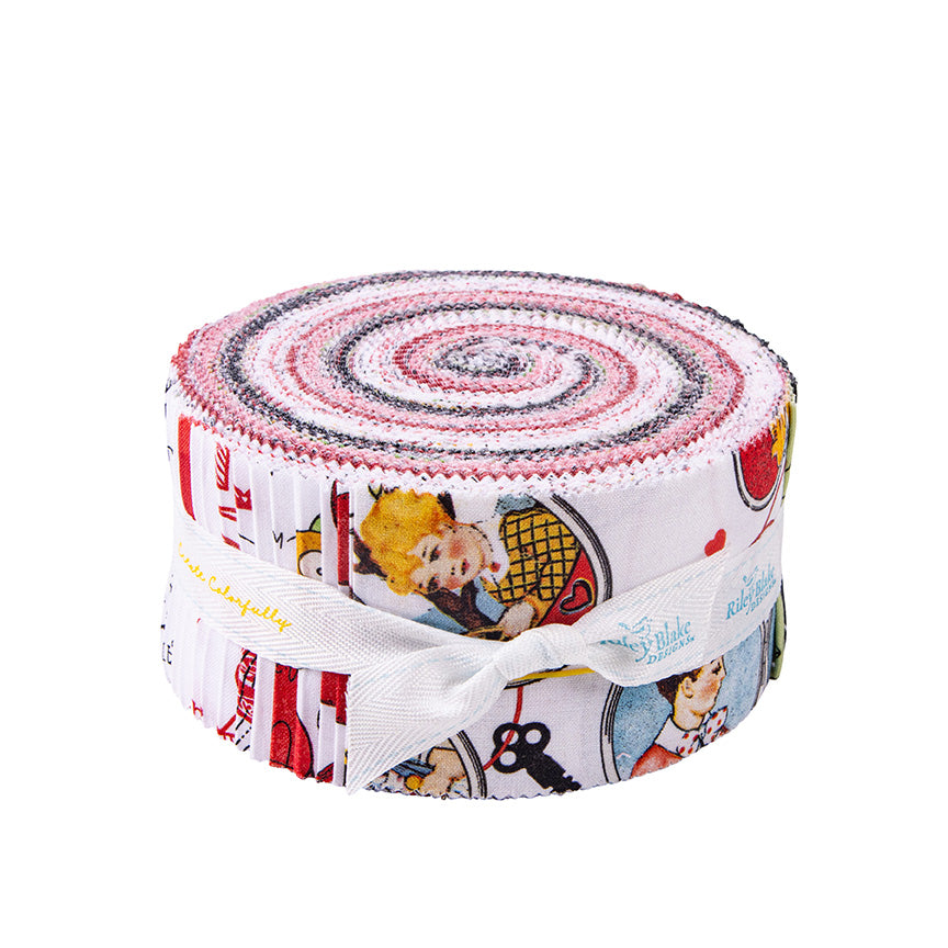 A roll of fabric with a vintage-style illustrated pattern, tied with a white ribbon. The fabric features a white base with red, pink, black, and yellow illustrations, including a blonde girl and a key.