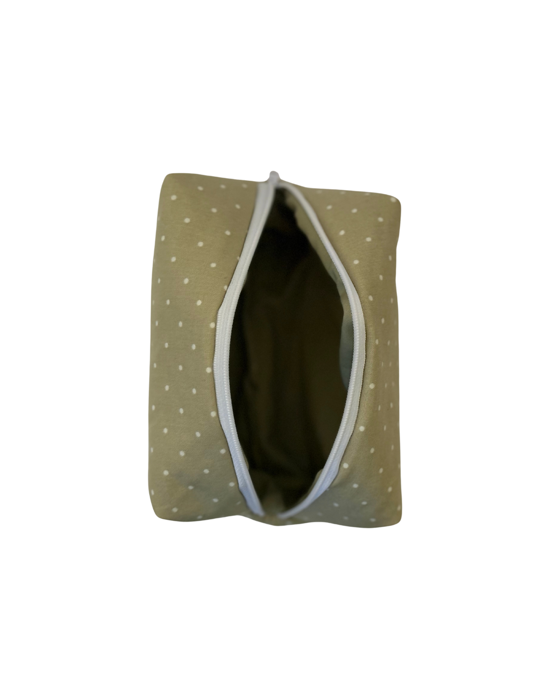 Green polka dot pouch with a open white zipper on a white background