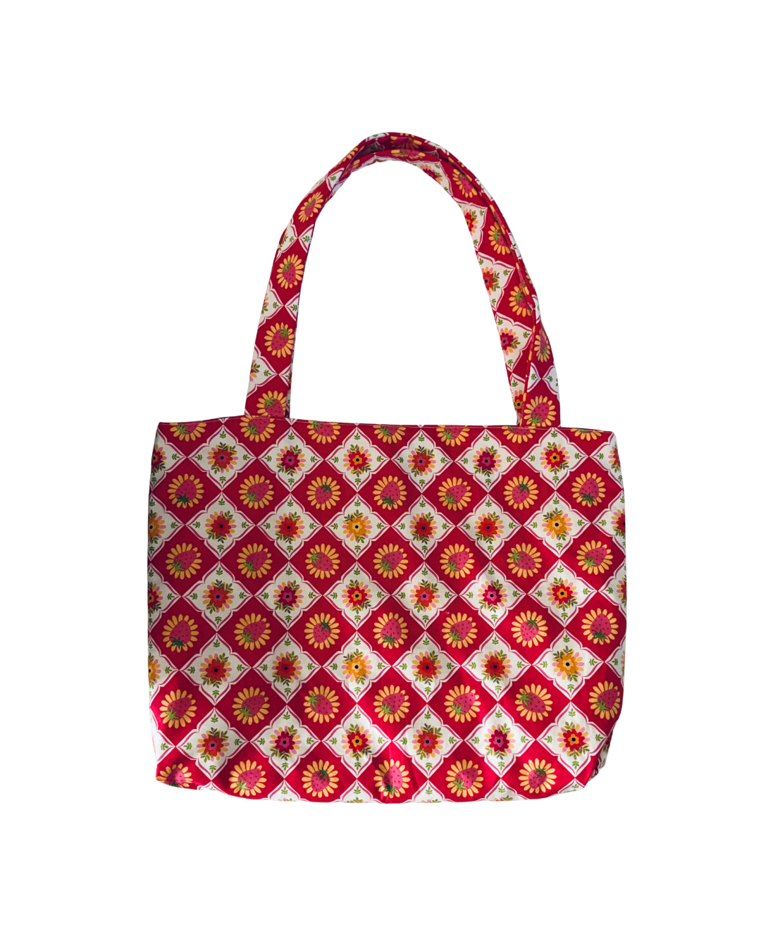 red, pink, and white strawberry lattice pattern tote bag against white background