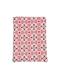 e-reader sleeve with red and pink floral pattern on a white background